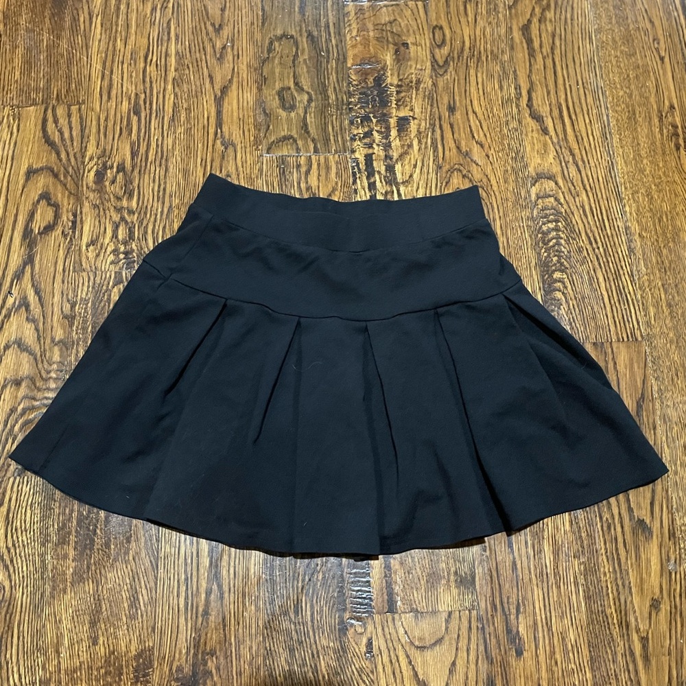 Chic Black Skater Skirt with shorts underneath.